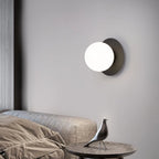 Opal Brass Frosted Globe Wall Sconce