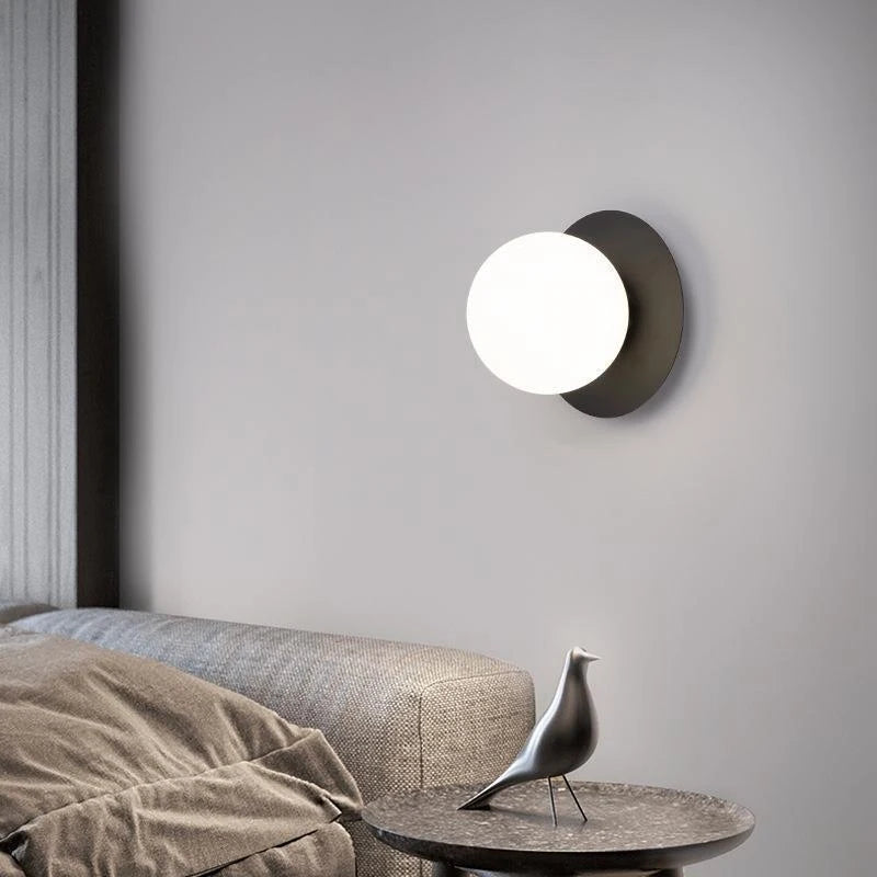 Opal Brass Frosted Globe Wall Sconce