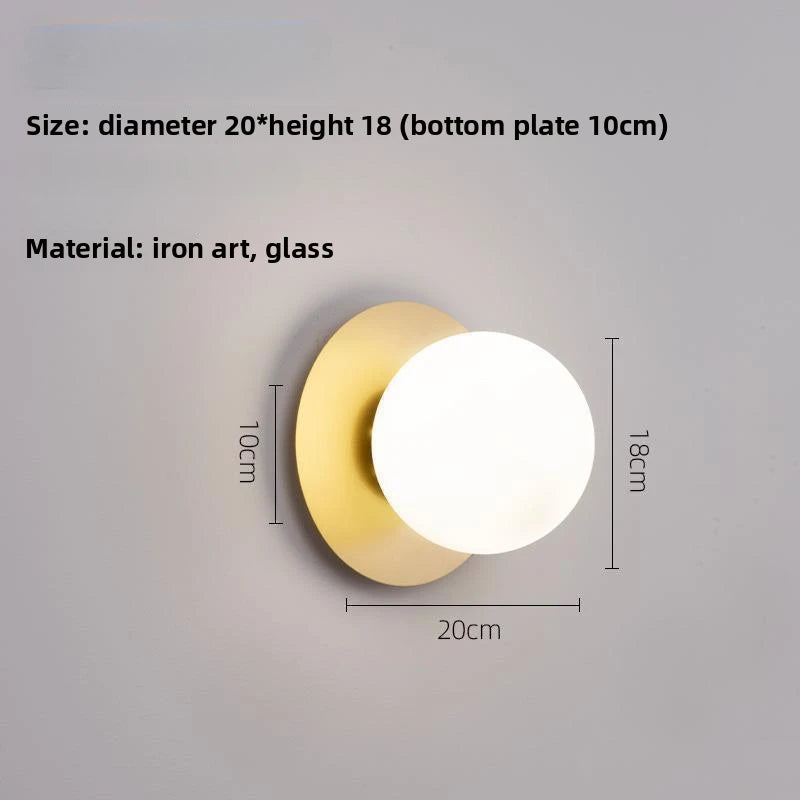 Opal Brass Frosted Globe Wall Sconce