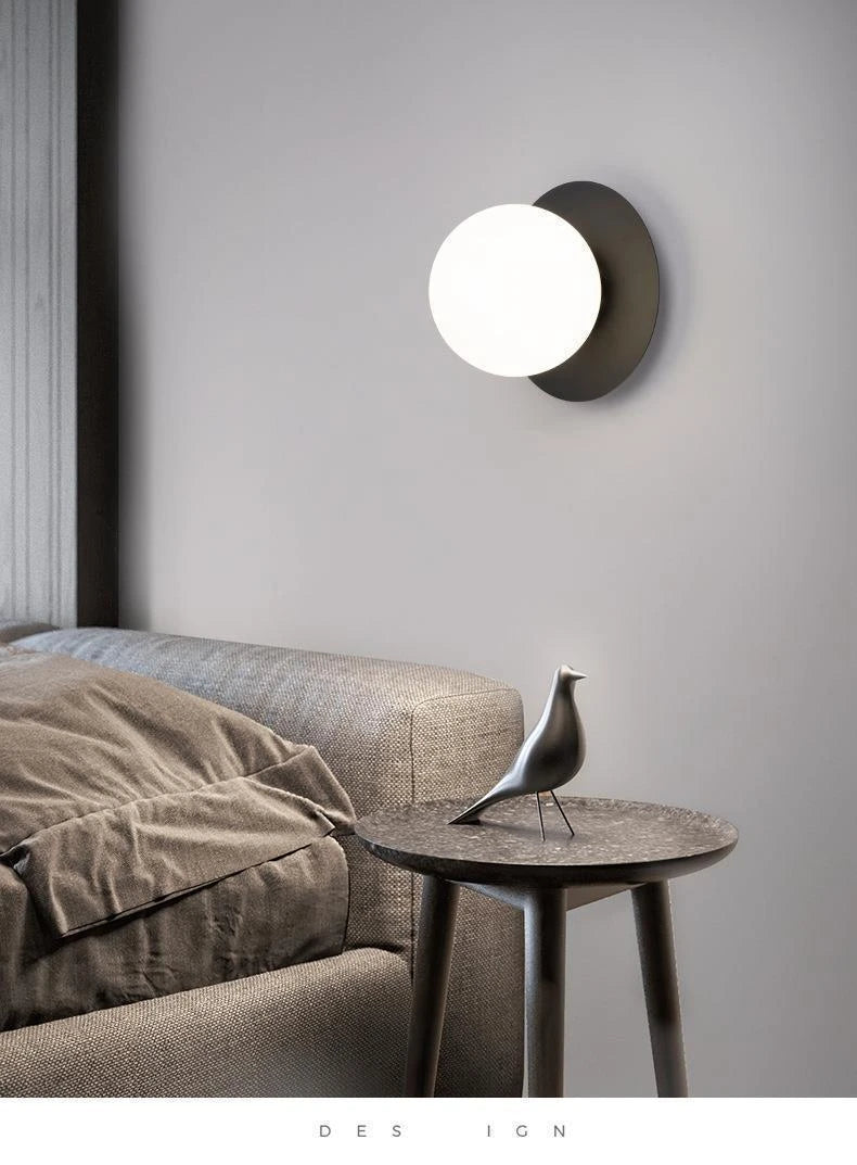 Opal Brass Frosted Globe Wall Sconce