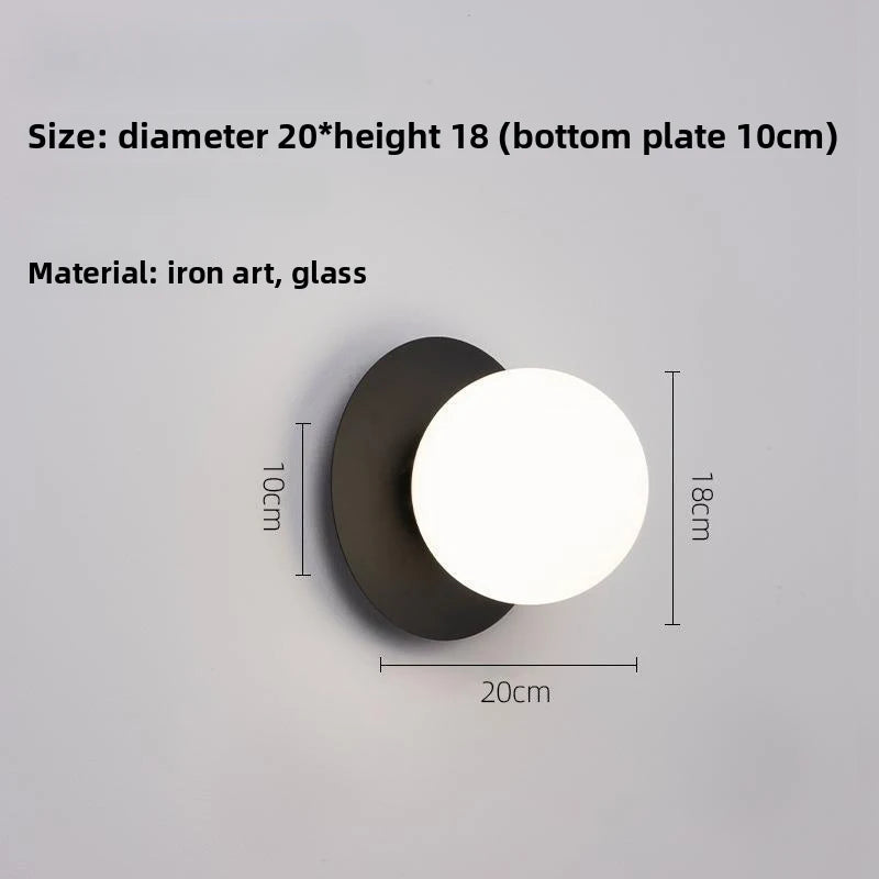 Opal Brass Frosted Globe Wall Sconce