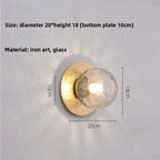 Opal Brass Frosted Globe Wall Sconce
