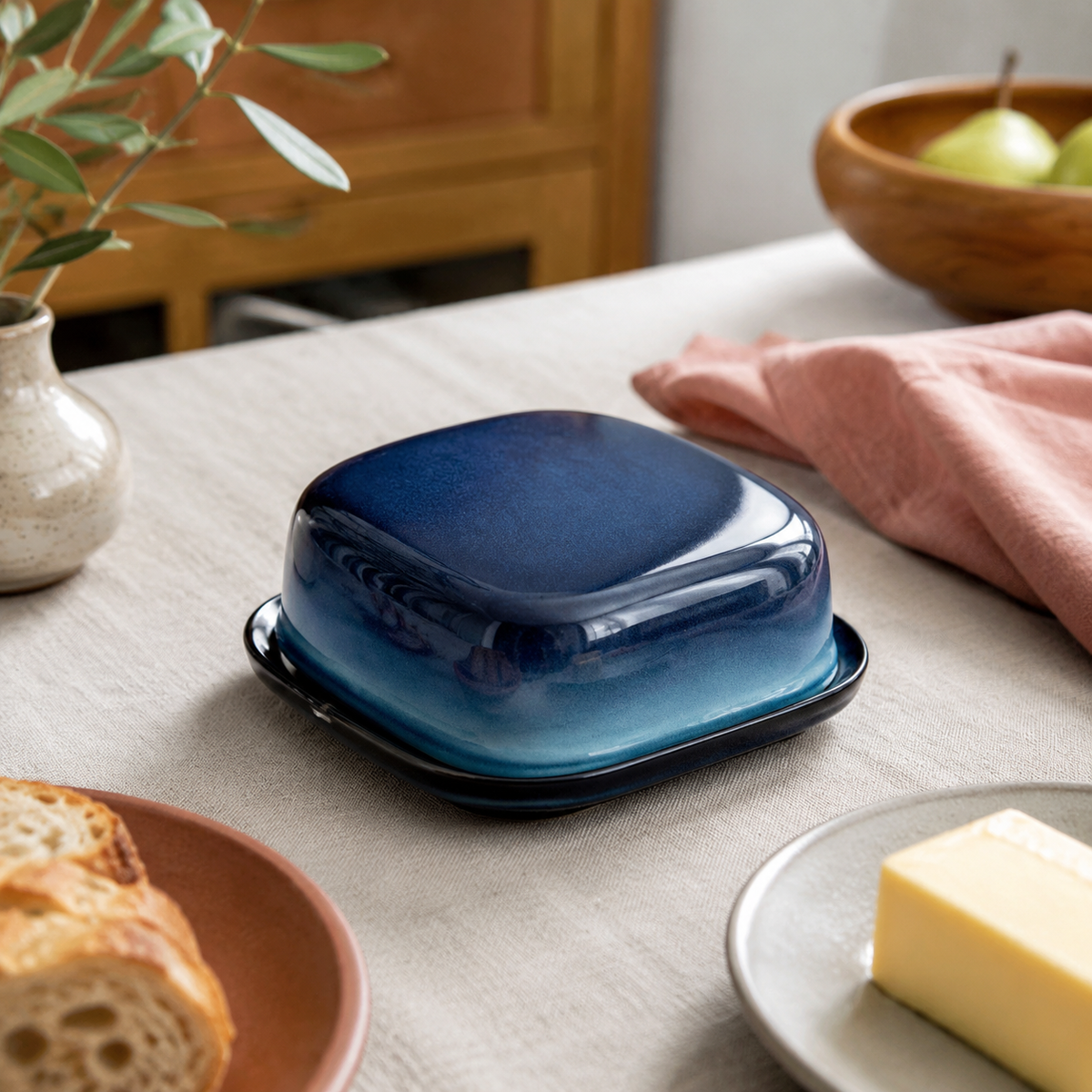 Etta Kiln-Glazed Butter Dish accurately represented in a cozy Vale & Lume interior