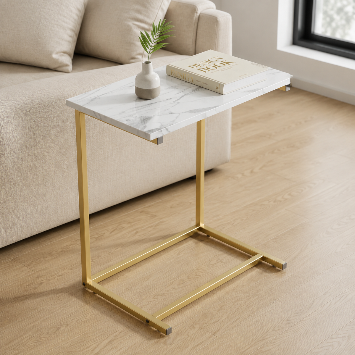 Kit C-Shaped Sofa Side Table — white marble-look top and gold frame lifestyle view